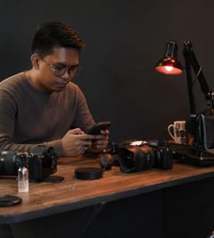 Photographer editing at a desk